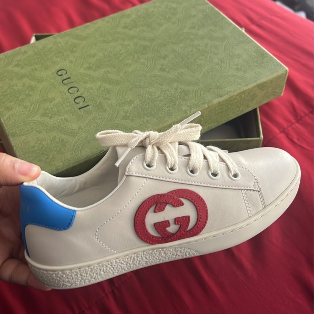Boy Gucci sneakers.